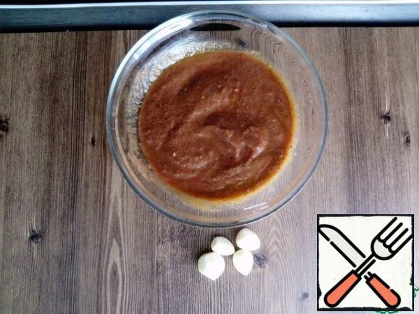 Mix tomato paste, adjika, garlic add salt to taste. (If you'll use homemade adjika paste can not add, and take just 200 grams. ajiki)