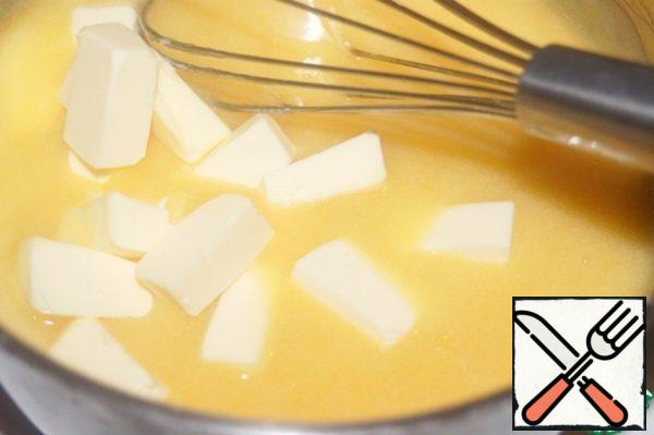 ... remove from heat and cool slightly, add butter.
