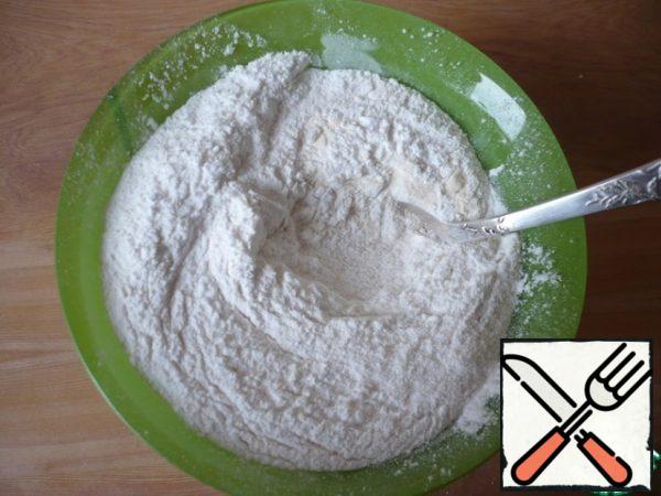 To make a white layer of jelly: pour coconut milk into a bowl. Add water to coconut milk.
