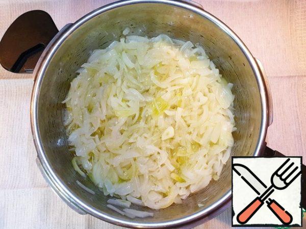 Simmer the onion over medium heat, stirring occasionally, for 30 minutes. During this time, the sharp onion flavor will go away, and the onion will become soft and transparent.