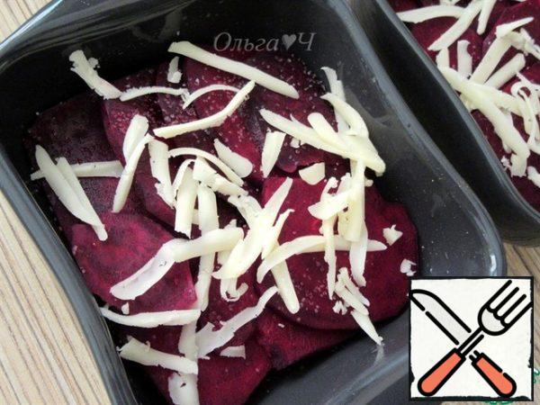 Then the beets. Sprinkle a little grated cheese.