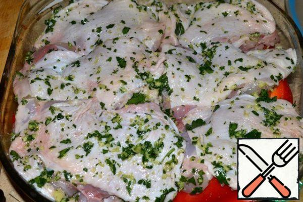 RUB the chicken thighs with a fragrant mixture of parsley and ginger. Spread on top of vegetables. Bake in the oven at 200 C until tender, about 35-40 minutes.