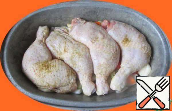 Put chicken legs on the vegetables.
Put the form in a well-heated oven for 30 minutes, do not cover with a lid!