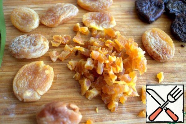 For the second filling, squeeze and cut the dried apricots.