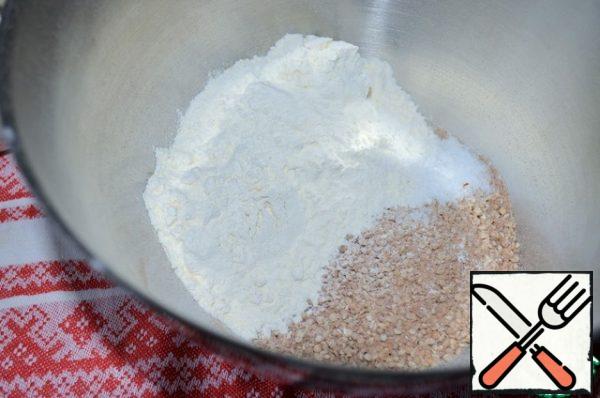 Grind buckwheat in a blender.
Mix the remaining flour, grits, salt.