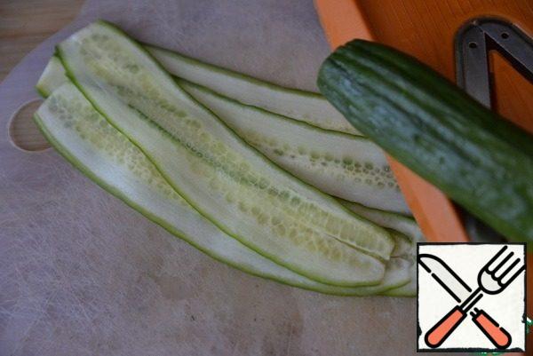 Cucumber cut into thin strips with a grater or peeler.