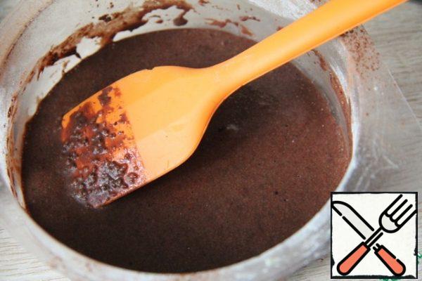 Mix milk with vegetable oil and cocoa.