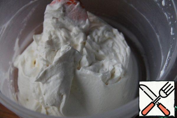 Beat together the mascarpone and half the whipped cream.