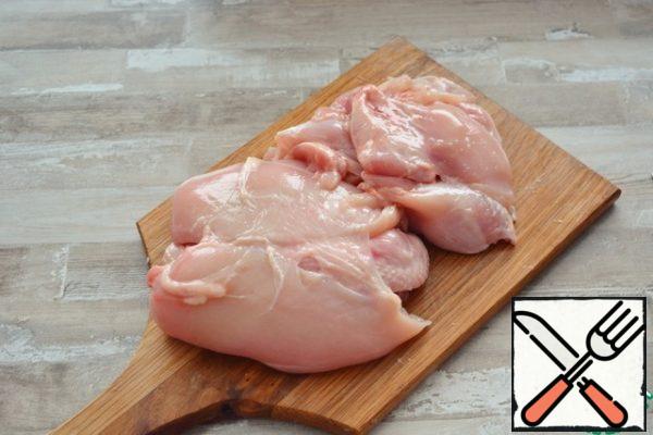 Remove all meat and skin from the chicken. The remaining bones and wings usually go to the broth for soup.