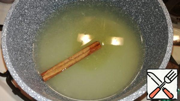 In a small saucepan, pour the lemon juice, add sugar, honey, water and cinnamon stick. Bring to a boil over low heat, stirring occasionally. Remove the cinnamon stick and allow to cool slightly.