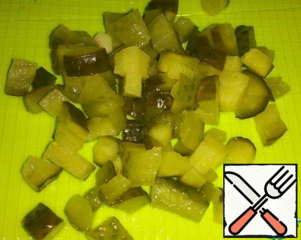 Pickled cucumber also cut into cubes.