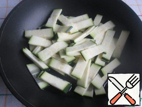 Zucchini cut into slices, or cubes, and lightly fry.