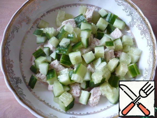 Fresh cucumbers also cut into small cubes.