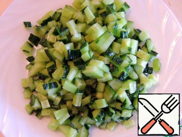 Cucumber is also cut into cubes.
