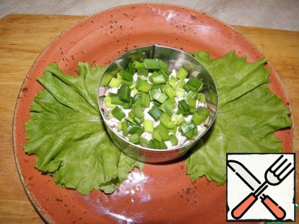Then finely chop the green onions.

