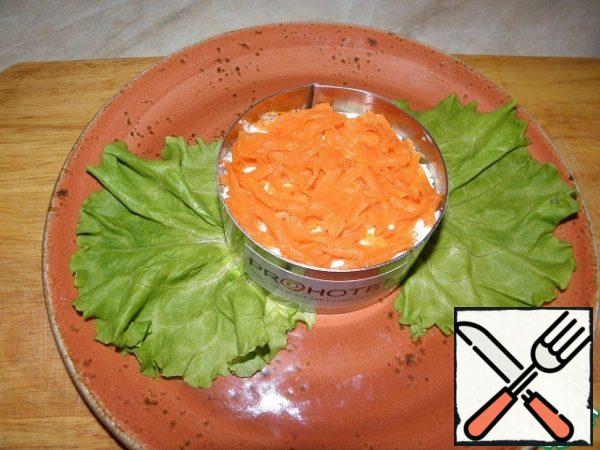 Boiled grated carrots.