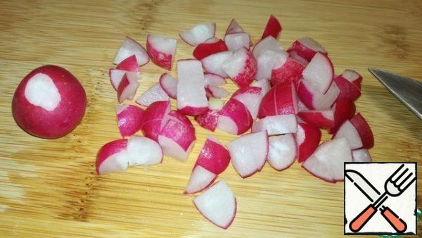 Radish cut into cubes and send in a bowl with the fifth layer.