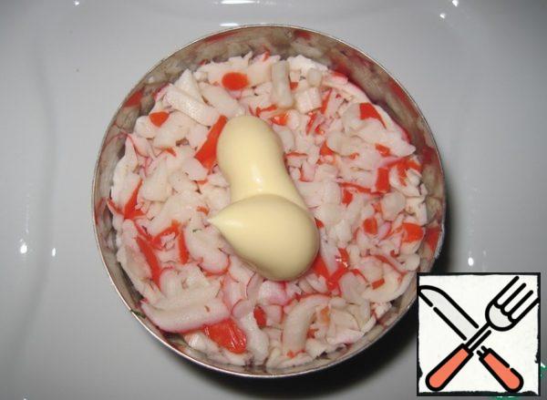 Layer 3-crab sticks, grated on a large grater,