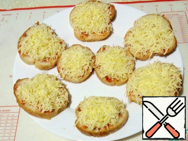 Top with grated cheese on a medium grater.
