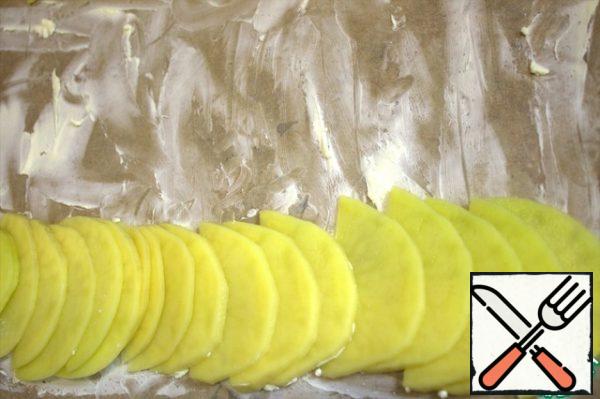Grease a baking sheet or a mold with butter, my parchment is greased with fat.
