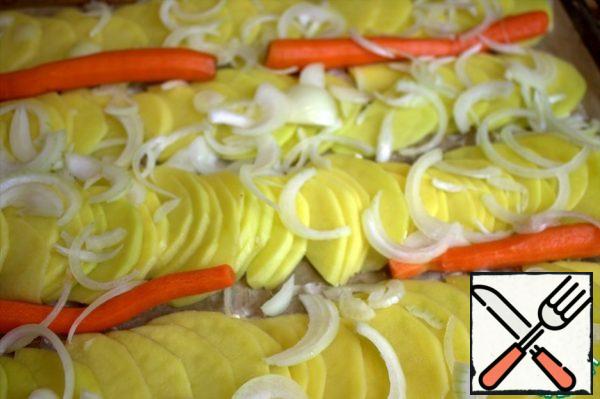 You can put more carrots, but it is better to boil it until half-cooked. Sprinkle onion half-rings on top.