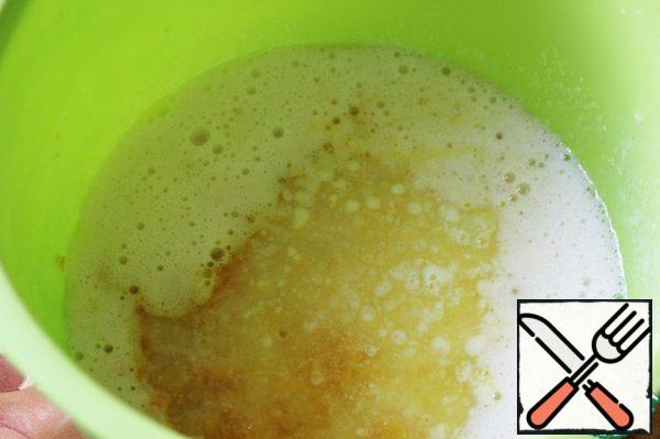 Pour in the melted and cooled butter, mix.
