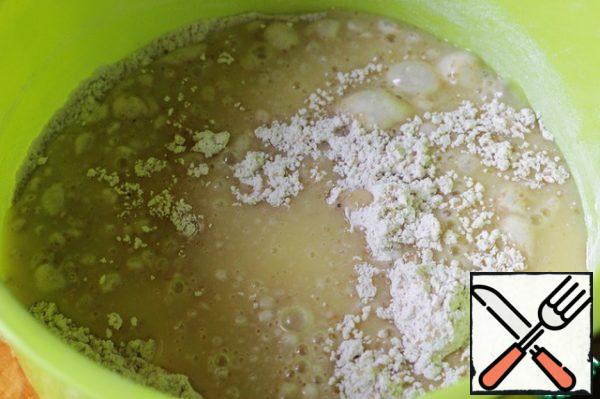 Add the mixture to the bowl with the dry ingredients and mix well with a spoon.