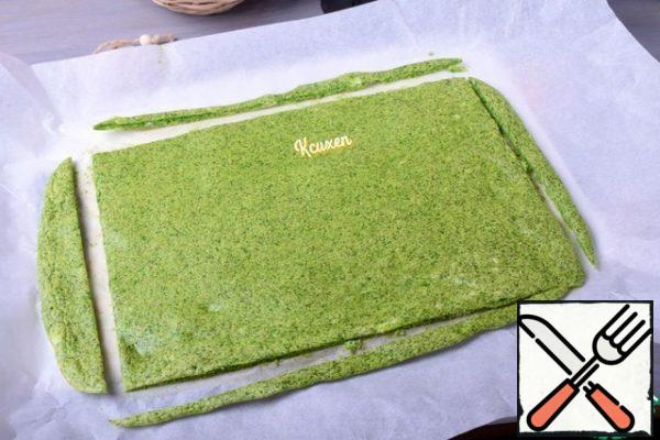 Cool the cake, and then trim the edges. Don't throw away the clippings, I'll tell you how to use them later.