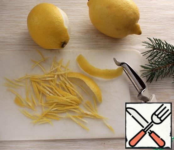 For new year's decor with 1-2 lemons peeler cut the zest and cut into thin strips.