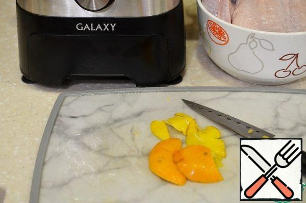 Cut the zest from half the orange and lemon.