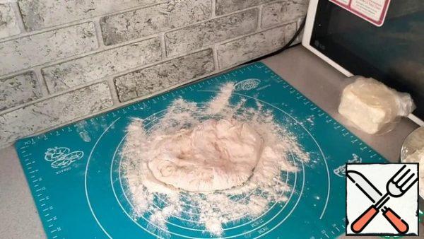 Spread the dough on a flat surface and knead thoroughly.