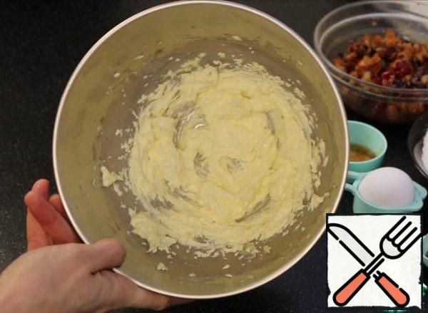 To the softened butter, add sugar and whisk until white.