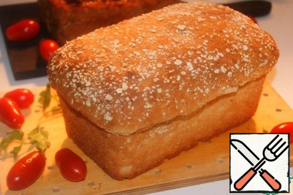 Free the bread from the mold and cool on the grill. To make the bread nice and well cut wrap it in a membrane and place it in the refrigerator overnight.
P. S And still, to bread when slicing not crumbled, it must be cut with a knife dipped in water.