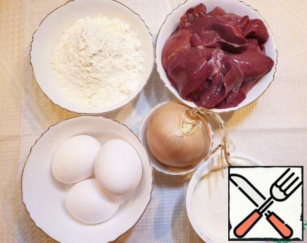 Let's start with making liver pancakes.
Prepare the necessary products.
All the veins must be cut out of the chicken liver.