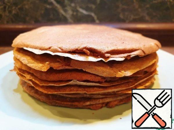 Stack the finished pancakes. Let them cool down.
From the specified number of ingredients, I got 11 pancakes. The diameter of the frying pan is 20 cm .
