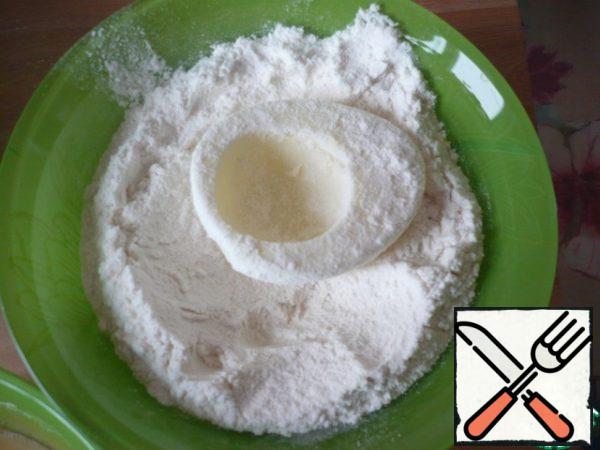 Roll the cooked egg whites first in flour.