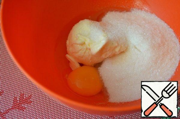 Whisk together the soft butter, sugar and egg.

