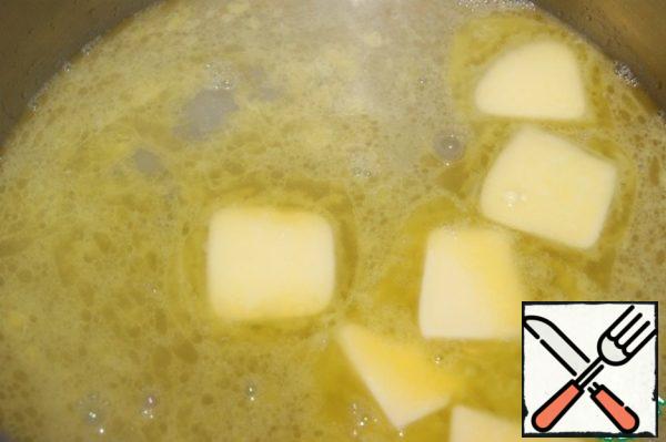 The dough is the basis:
In a saucepan with a thick bottom, put water, oil, salt and sugar. Bring to a boil and completely dissolve the butter.