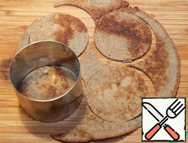 You need to cut circles out of each pancake.