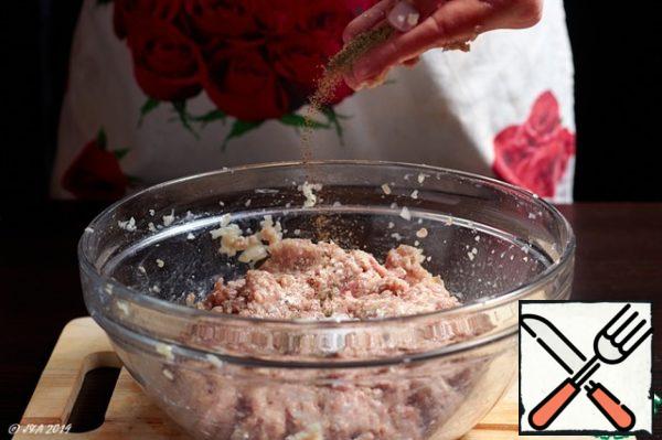 Add black pepper and nutmeg. Mix thoroughly with your hands.
