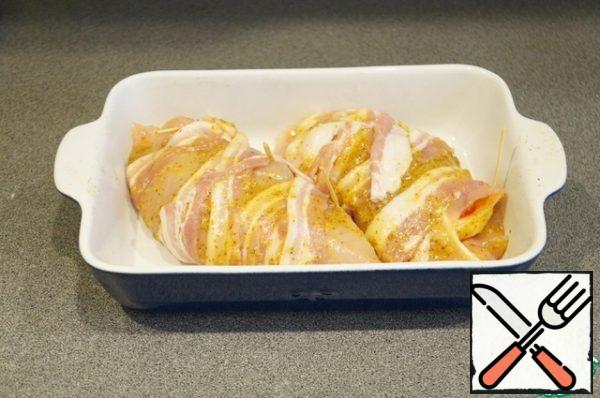 Put the pockets in a form well greased with a mixture of honey and mustard. Put a sprig of rosemary and a sprig of thyme. Wrap with foil.
