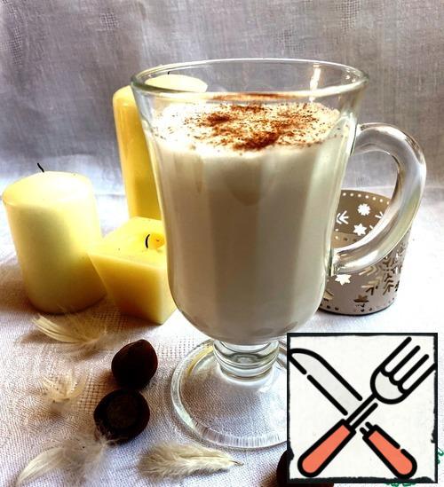 In a glass, pour the whiskey and wine, mix.
Pour the milk with the foam and sprinkle with ground cinnamon.