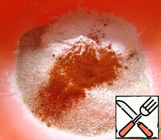 Dough: in a bowl, combine two types of flour, a pinch of salt and paprika. Stir.