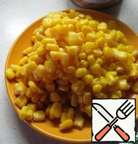 Drain the liquid from the corn.