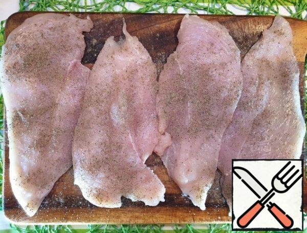 Season the fillets with salt and pepper on both sides.
