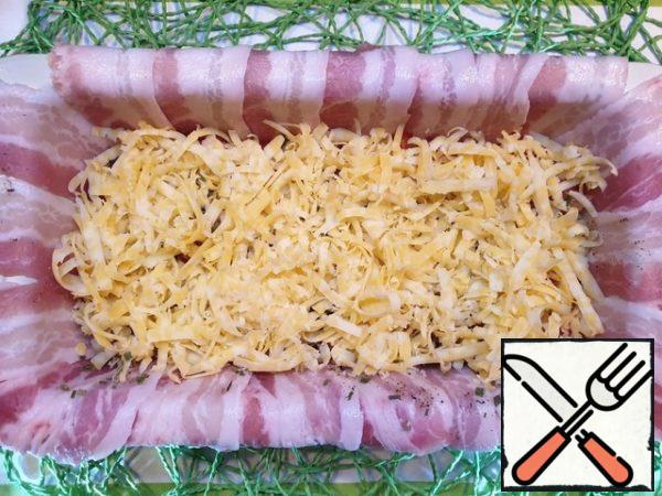 Layer of grated cheese.