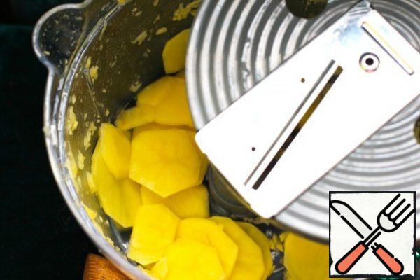 Peel the potatoes and grate them on a very thin grater. I used a slicer in a food processor. Salt the potatoes.
