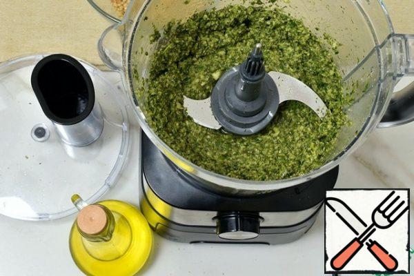 Open the lid of the combine and use a spatula to collect the sauce from the edges of the bowl. Pour in the lemon juice. turn the food processor on at first speed and pour in the olive oil in a thin stream, allowing the sauce to become homogeneous.