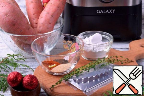 Prepare the ingredients and a large baking tray and turn on the oven so that it heats up to 205°C.
You can take any spices to taste, and replace fresh thyme with dried.
I will cut sweet potatoes using a food processor, it has a function "slicing French fries".
