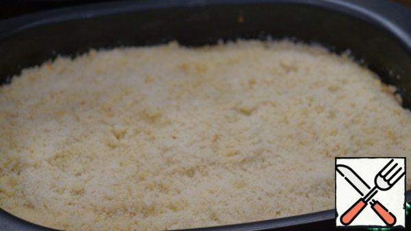 Remove the base from the oven and cover with a streusel.
